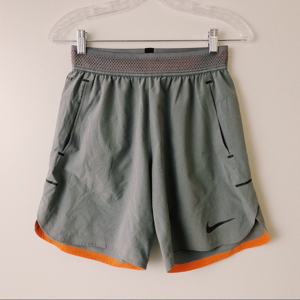 Nike Dri-fit Grey shorts with orange detail